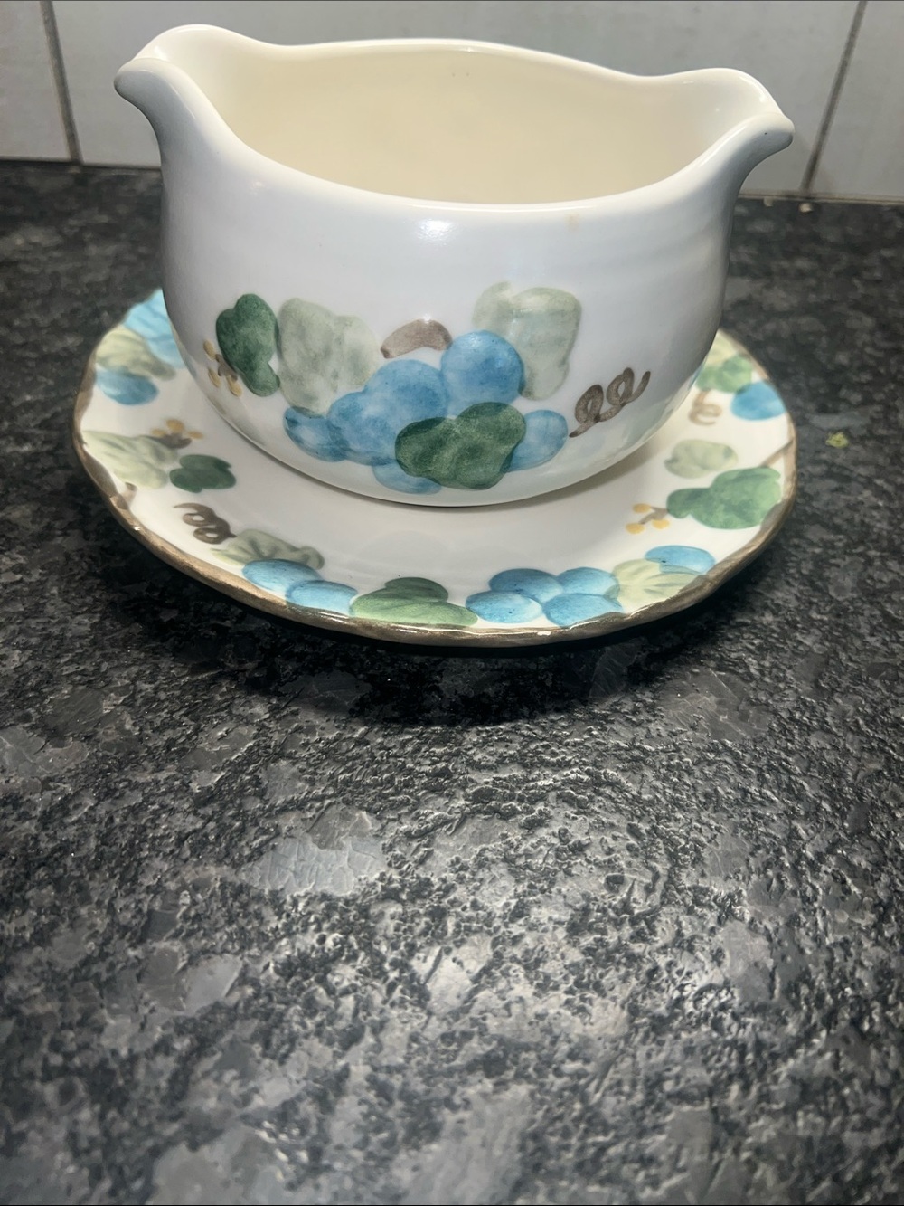 Ceramic double sided gravy boat with Blue and Green Grape Motif. One piece.